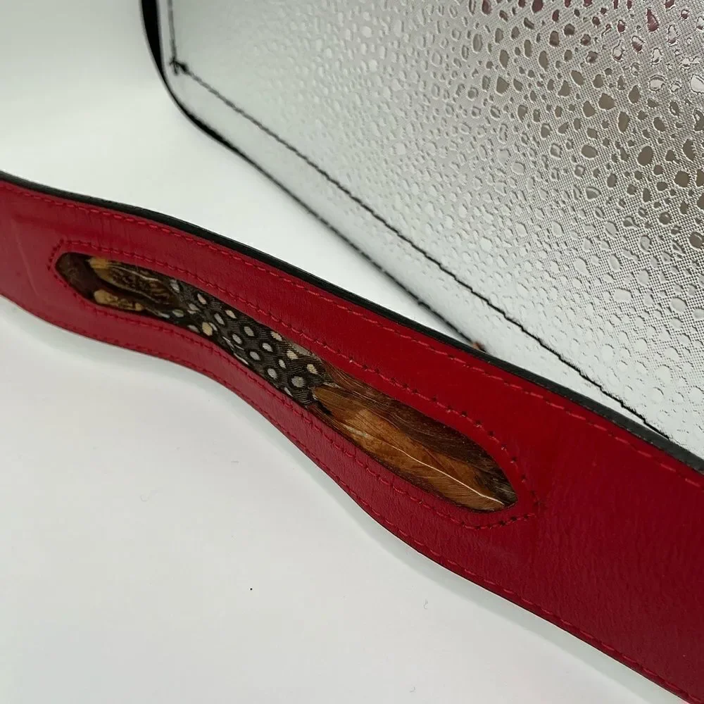 Red Rondina leather belt with feather inlays